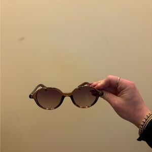 Oval brown tortoise women’s sunglasses